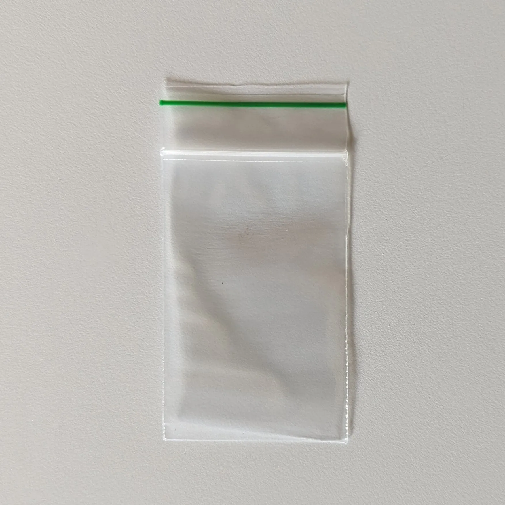 2" x 3" x 2 mil X-Small Clear Landfill-Biodegradable Plastic Ziplock Bags with Resealable Zipper, Green Line (Pack of 100)